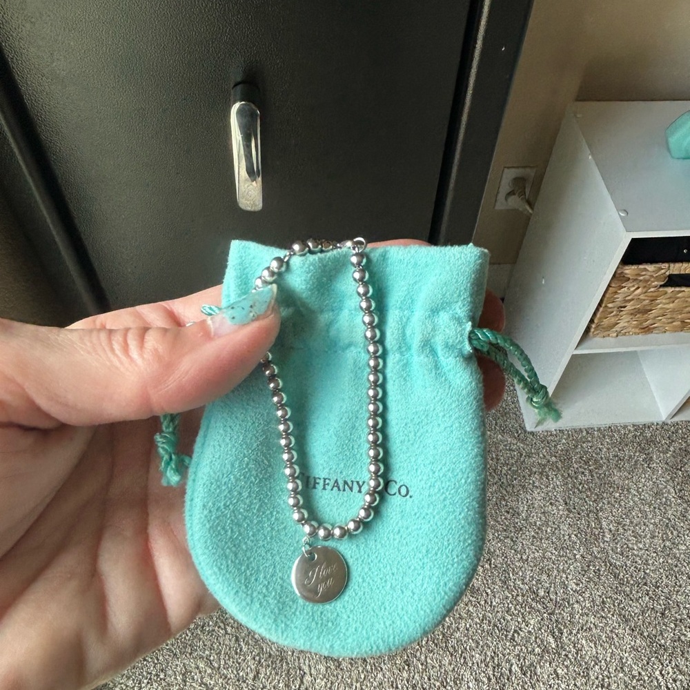 Tiffany discontinued “I Love You” notes bead bracelet
